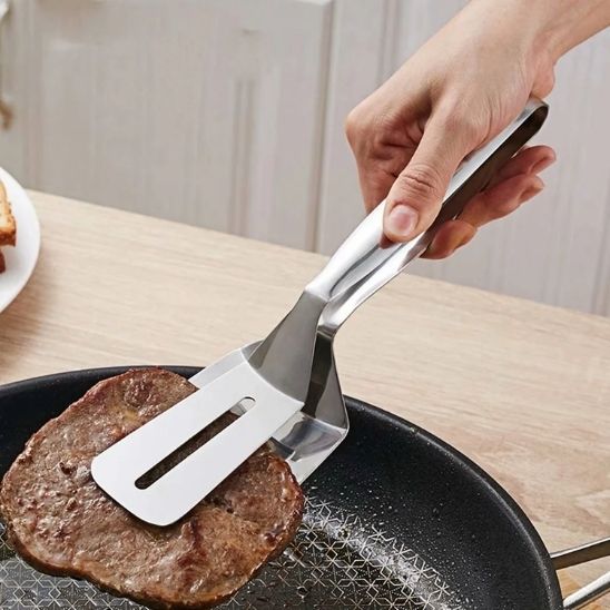 spatule-pince-inox-saisit-morceaux-de-viande