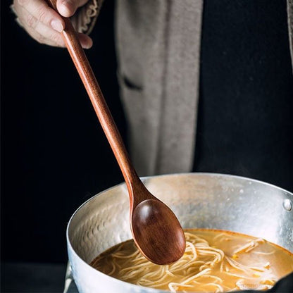 Cuisinière tient cuillères en bois à manche long 