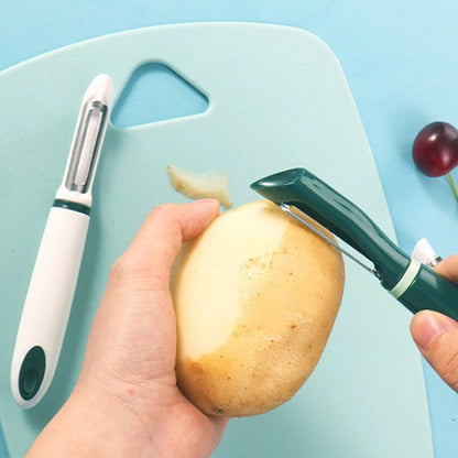 homme-pèle-patate-avec-économe-droit-vert