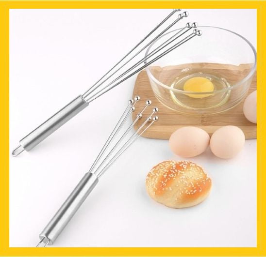 fouet cuisine accoté bol oeuf