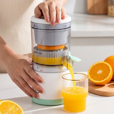 Presse Agrume Électrique femme presse jus d'orange