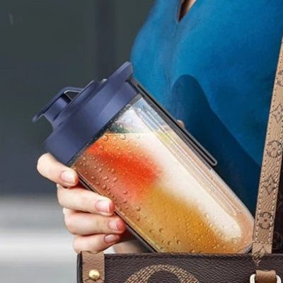 Presse agrume électrique dans un sac fourre-tout