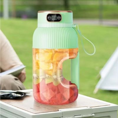 Presse agrume electrique sur glacière de pique-nique