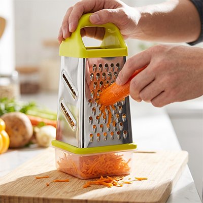 Râpe à légumes manuelle verte homme râpe carotte