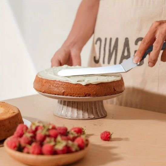 cuisinier glace gâteau spatule